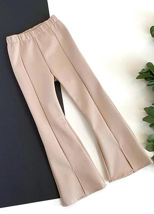 Штани кльош, палаццо, штани з розрізами