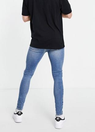 Asos design power stretch в винтажном стиле с дырками на коленях3 фото