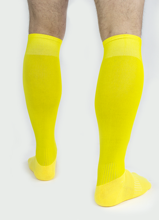 Футбольные высокие гетры желтые размер 40-442 фото