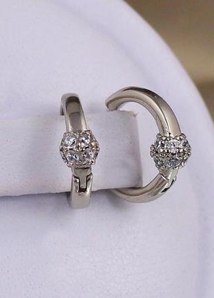 Сережки кільця хuping jewelry гладкі з гайкою з камінців посередині 10 мм сріблясті