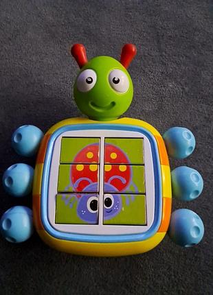 Музыкальная игрушка жук пазл tomy