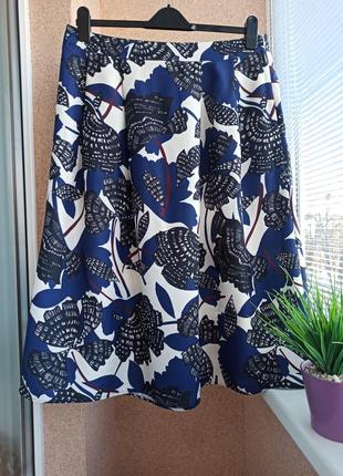 Красива літня спідниця вільного силуету в квітковий принт