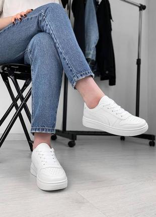 Білі кросівки pum