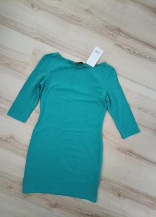 Бірюзова трикотажна сукня