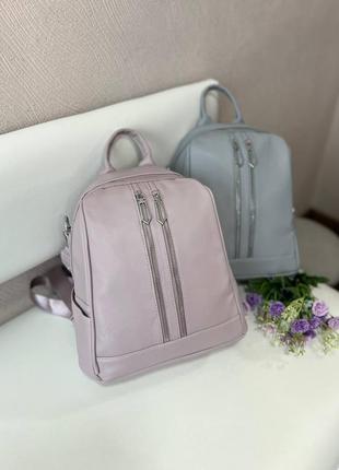 Вмісткі рюкзаки (блакитний, рожевий), можно носити як сумку.2 фото