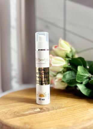 Сонцезахисний крем для обличчя з ліфтинг-ефектом spf50+/pa+++ top beauty 50 мл