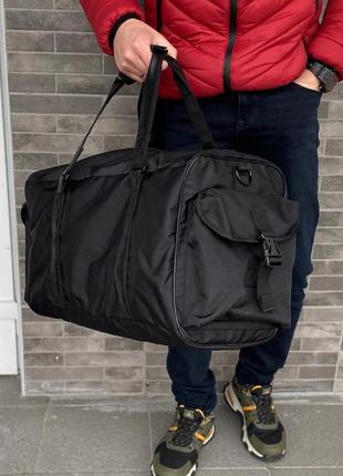 Спортивна дорожня чорна сумка через плече чоловіча2 фото