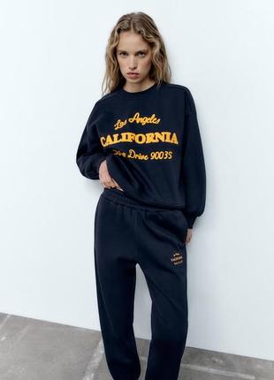 Теплые синие брюки-джоггеры с вышитой надписью california zara утепленные спортивные штаны на флисе зара8 фото