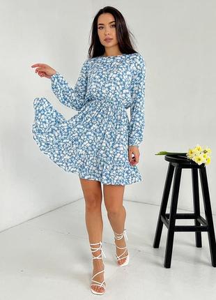 Блакитна квіткова сукня з воланом3 фото