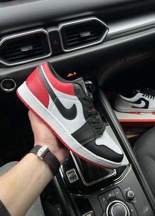 Чолові кросівки air jordan 1 low чорні з красним4 фото