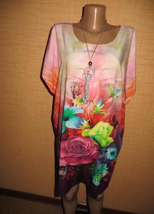 Платье с цветочным принтом.1 фото