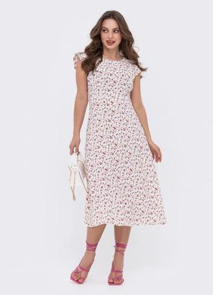 Фантастическое розовое летнее платье с цветочным принтом приталенного кроя5 фото