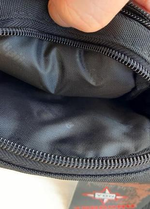 Чоловіча сумочка через плече зі щільної тканини10 фото