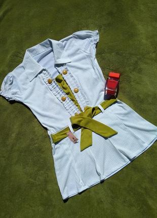 Плаття-туніка для дівчинки з зеленим бантом