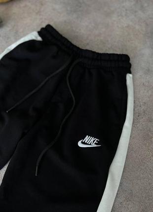 Трендовые брюки nike/0 штаны найк7 фото