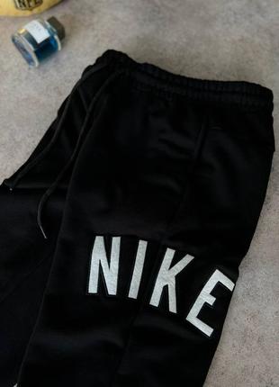 Топовые брюки nike/0 штаны найк3 фото