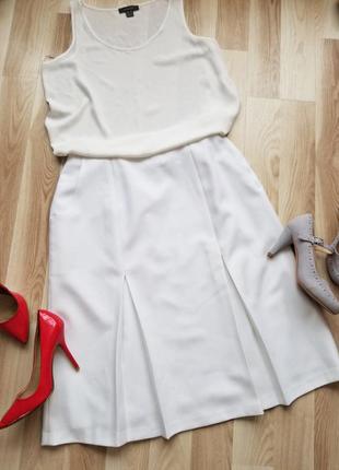 Стильная базовая белая юбка миди юбка трапеция юбка с высокой посадкой трапецевидная юбка женская белоснежная5 фото