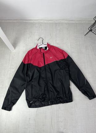 Вітровка nike storm-fit women`s nylon jacket1 фото