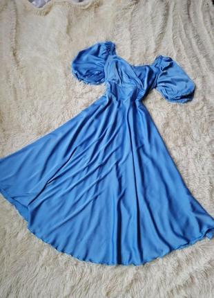 Красива ефектна сукня в міді зі штучного шовку1 фото