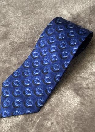 Шовкова краватка англія london з об'ємним принтом шашки колір синій