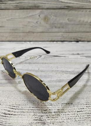 Солнцезащитные очки черные, овальные, унисекс в металлической оправе ( без брендовые )3 фото