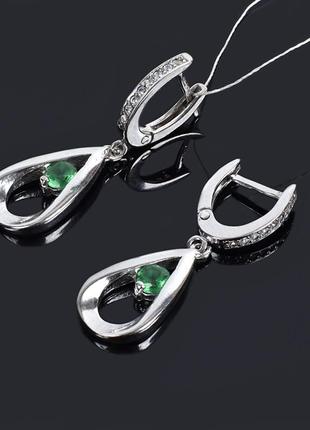 Срібні сережки підвіски з зеленим каменем1 фото