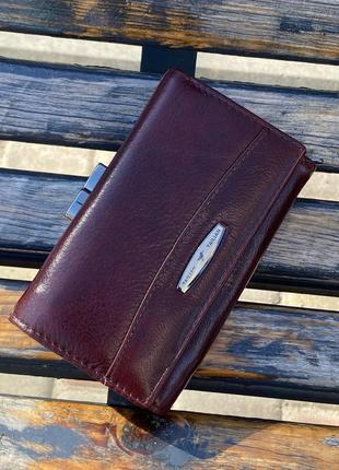 Шкіряний жіночий гаманець компактний. коричнево-бордовий