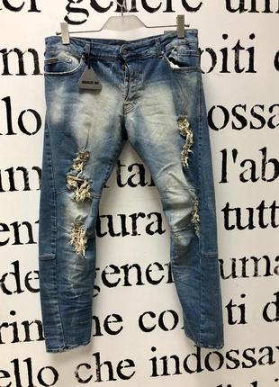 Стильные модные рваные итальянские джинсы1 фото