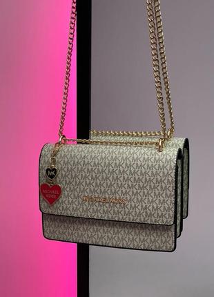 Жіноча сумочка michael kors mini bag cream
