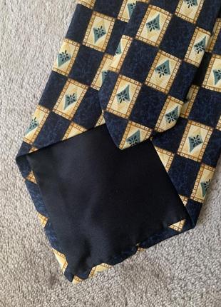 Шелковый галстук англия london с геометрическим сине-бежевым принтом5 фото