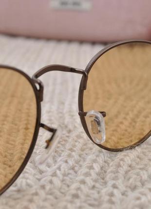 Фирменные солнцезащитные круглые очки rita bradley polarized фотохромные хамелеон маленькие4 фото