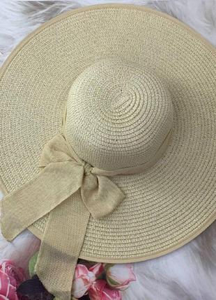 Женская широкополая шляпа с полями 15 см и бантом бежевая5 фото
