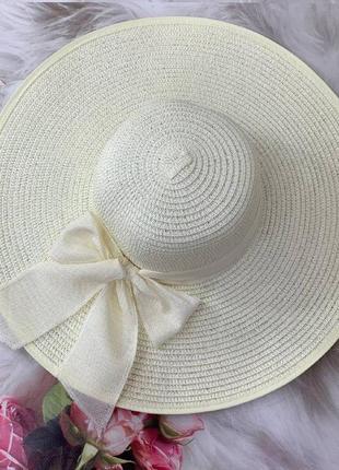 Женская широкополая шляпа с полями 15 см и бантом молочная2 фото