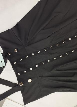 Платье комбинезон с подтяжками черное с заклепками серебристыми юбка5 фото