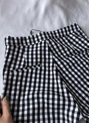 Чорно-білі брюки у клітинку, стрейчеві штани stradivarius6 фото