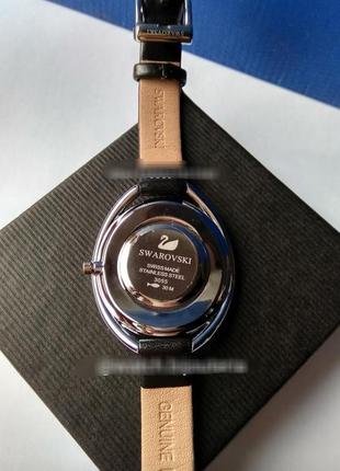 Женские часы swarovski с черным ремешком и циферблатом, серебро