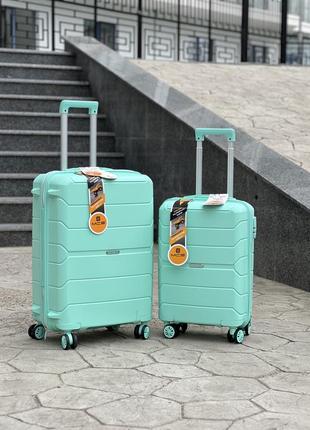 Качественный чемодан из полипропилен,модель 366,прорезиненный,надежная,колеса 360,кодовый замок,туреченя2 фото