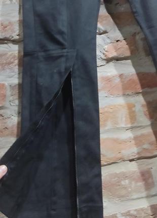 Брендовые джинсы с разрезами спереди6 фото