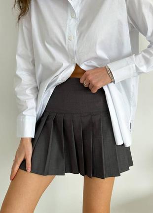 Спідниця чорна сіра бежева юбка стильна плісерована костюмна коротка міні на літо9 фото