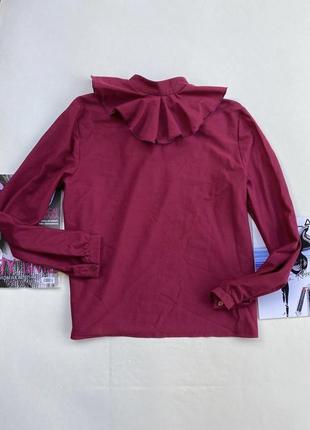 Красивая бордовая блуза винна
