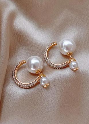 Сережки жіночі елегантні в каменях із перлами2 фото