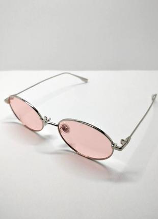 Рожеві окуляри із срібною оправою