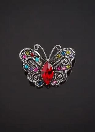 Невеличка брошка метелик під червлене срібло