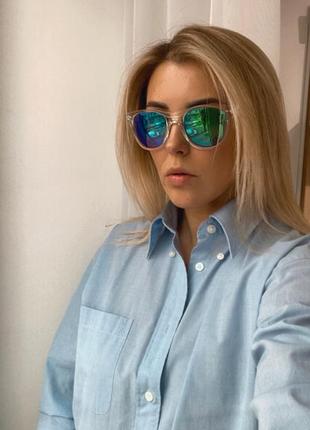 Очки в прозрачной пластиковой оправе зеркальные