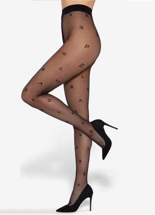 Оригинальные фантазийные колготки с узором буквы в телесном и черном цвете