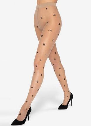 Оригинальные фантазийные колготки с узором буквы в телесном и черном цвете