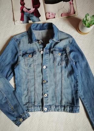 Женская джинсовая куртка.2 фото