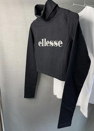 Стильный женский черный гольф от ellesse. оригинал