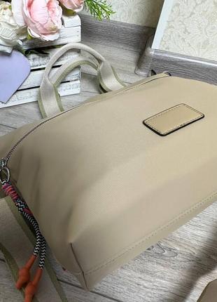 Компактная стильная женская сумка из водонепроницаемой ткани5 фото
