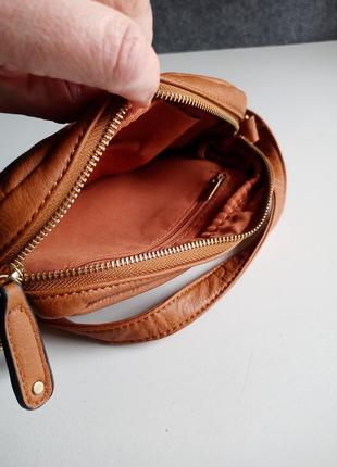 Жіноча сумочка на довгому ремінці6 фото
